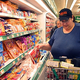 Obesity sufferer Tammy Bledsoe shops at an Atlanta, GA grocery store.